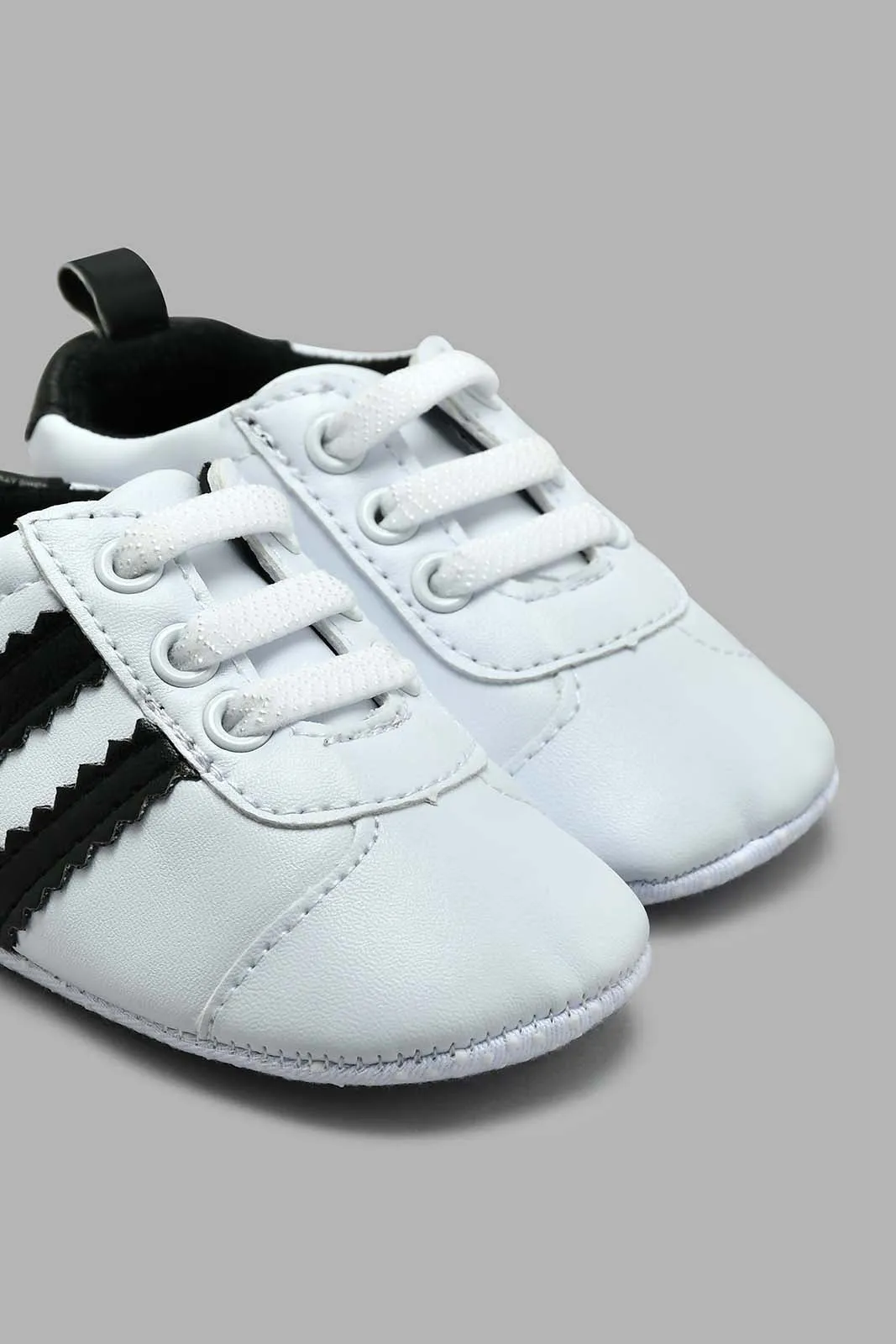 White And Black Slip-On Pram Shoe